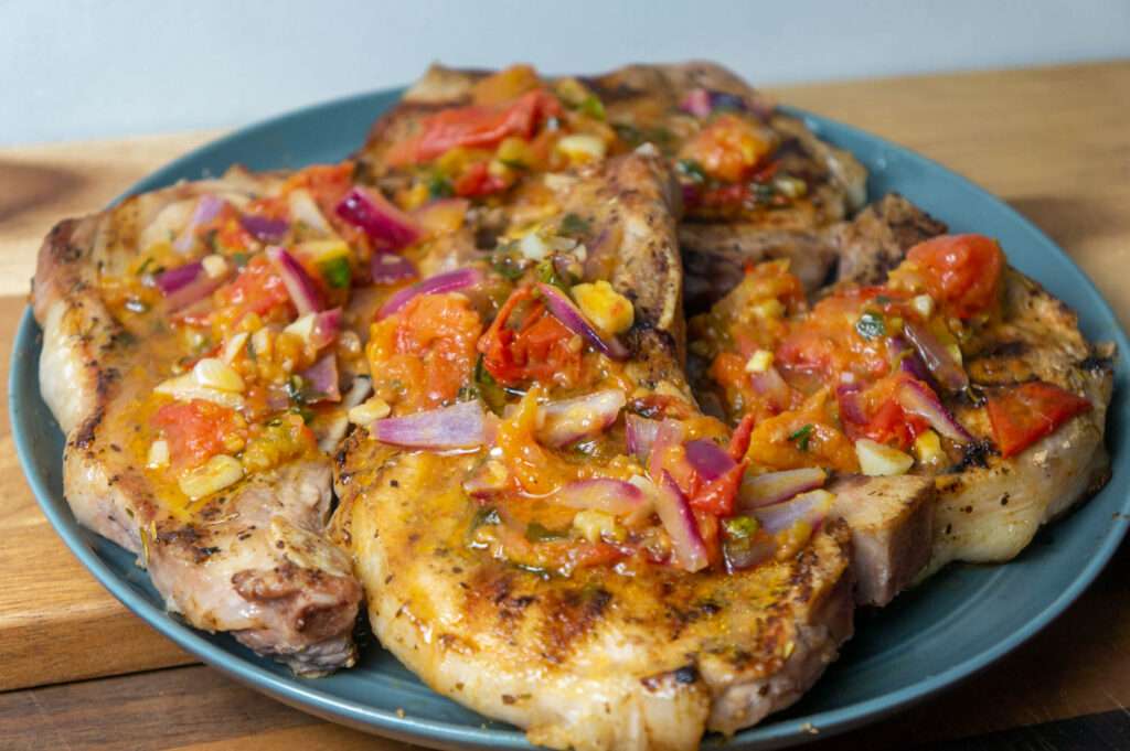 Baked Pork Chops with Tomato, Garlic Butter: A Delicious and