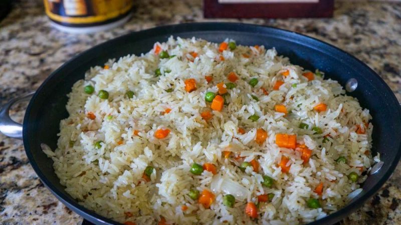 Delicious Haitian White Rice with Peas and Carrots